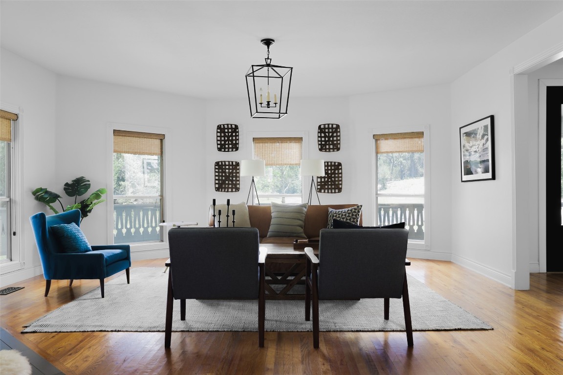 11505 Southwest Oaks Austin, TX 78737 - Photo 9 of 38 a view of a dining room with furniture window and wooden floor
