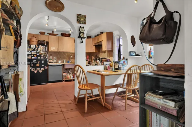 a view of a dining room with furniture