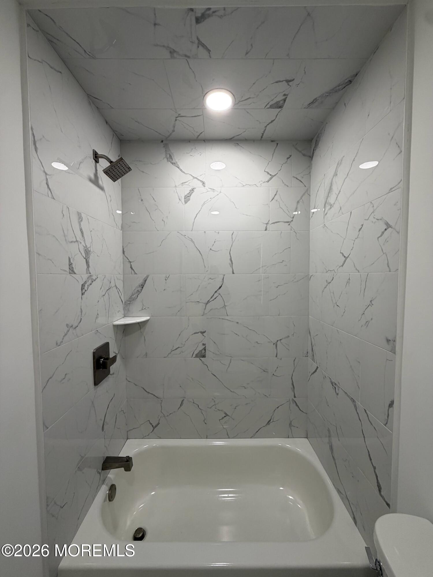 13 Pittenger Pond Road Freehold, NJ 07728 - Photo 12 of 16 a bathroom with a bathtub