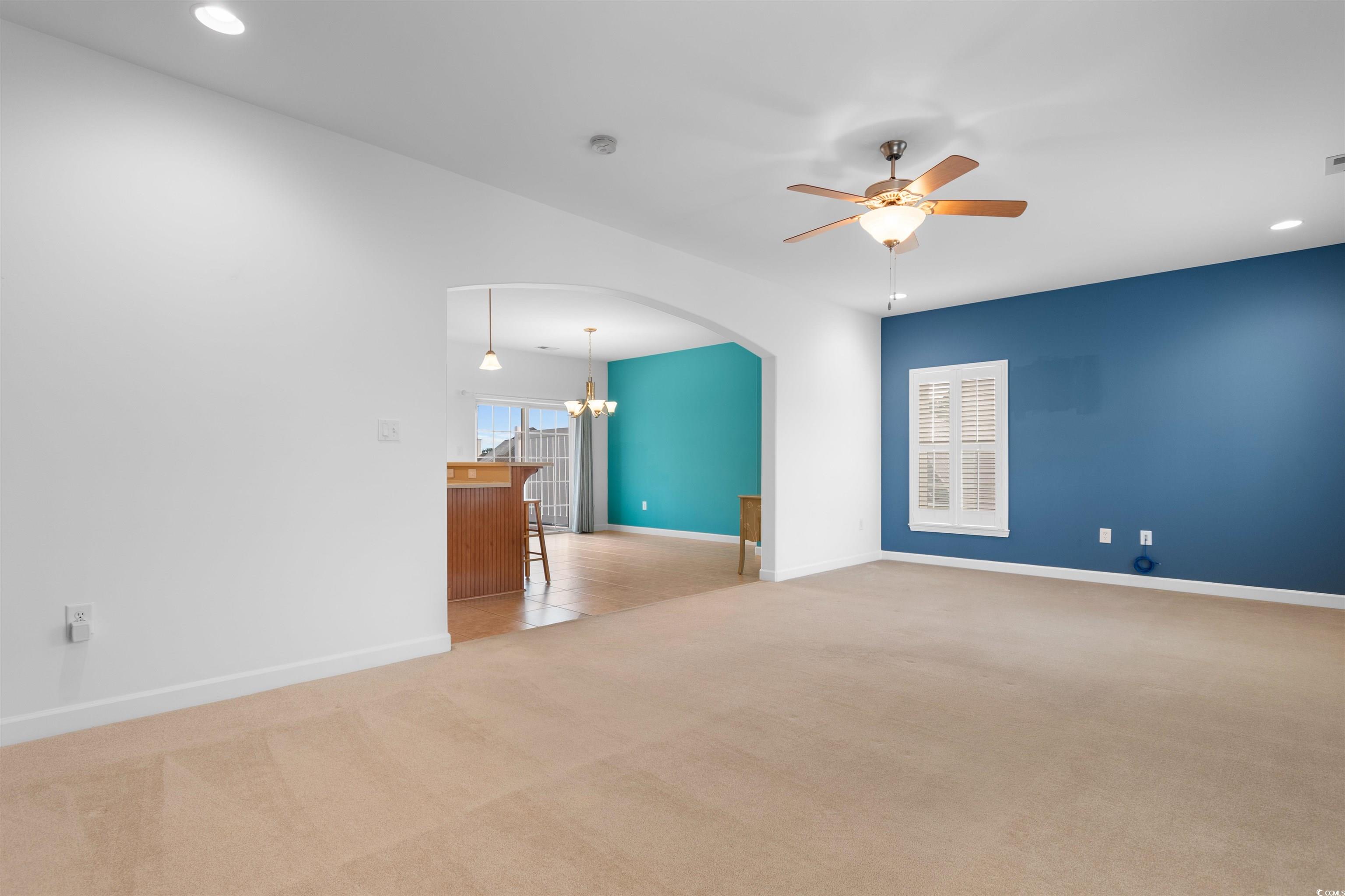 141 Terracina Circle Myrtle Beach, SC 29588 - Photo 14 of 40 Carpeted spare room featuring ceiling fan with not