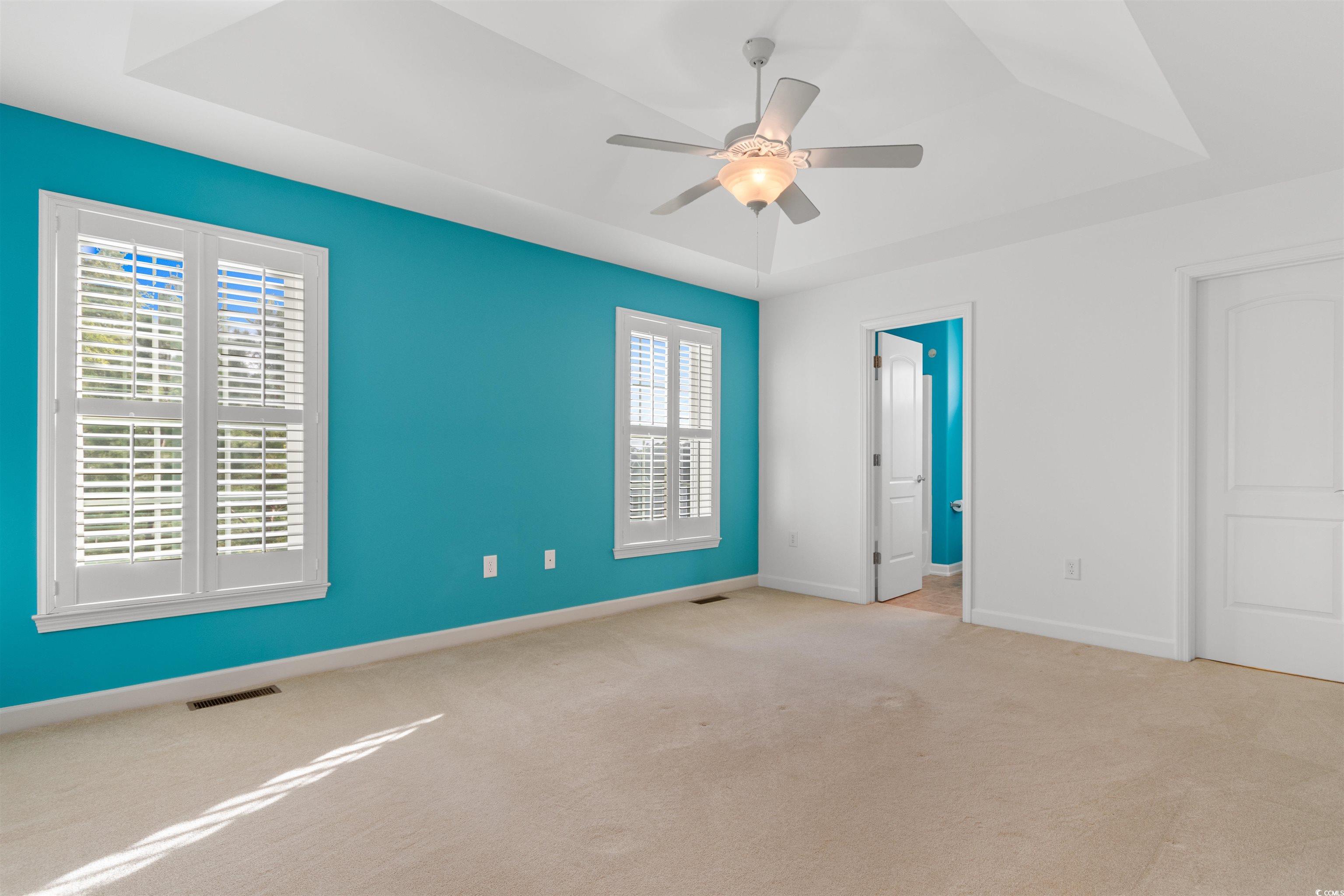 141 Terracina Circle Myrtle Beach, SC 29588 - Photo 16 of 40 Spare room with ceiling fan, plenty of natural lig
