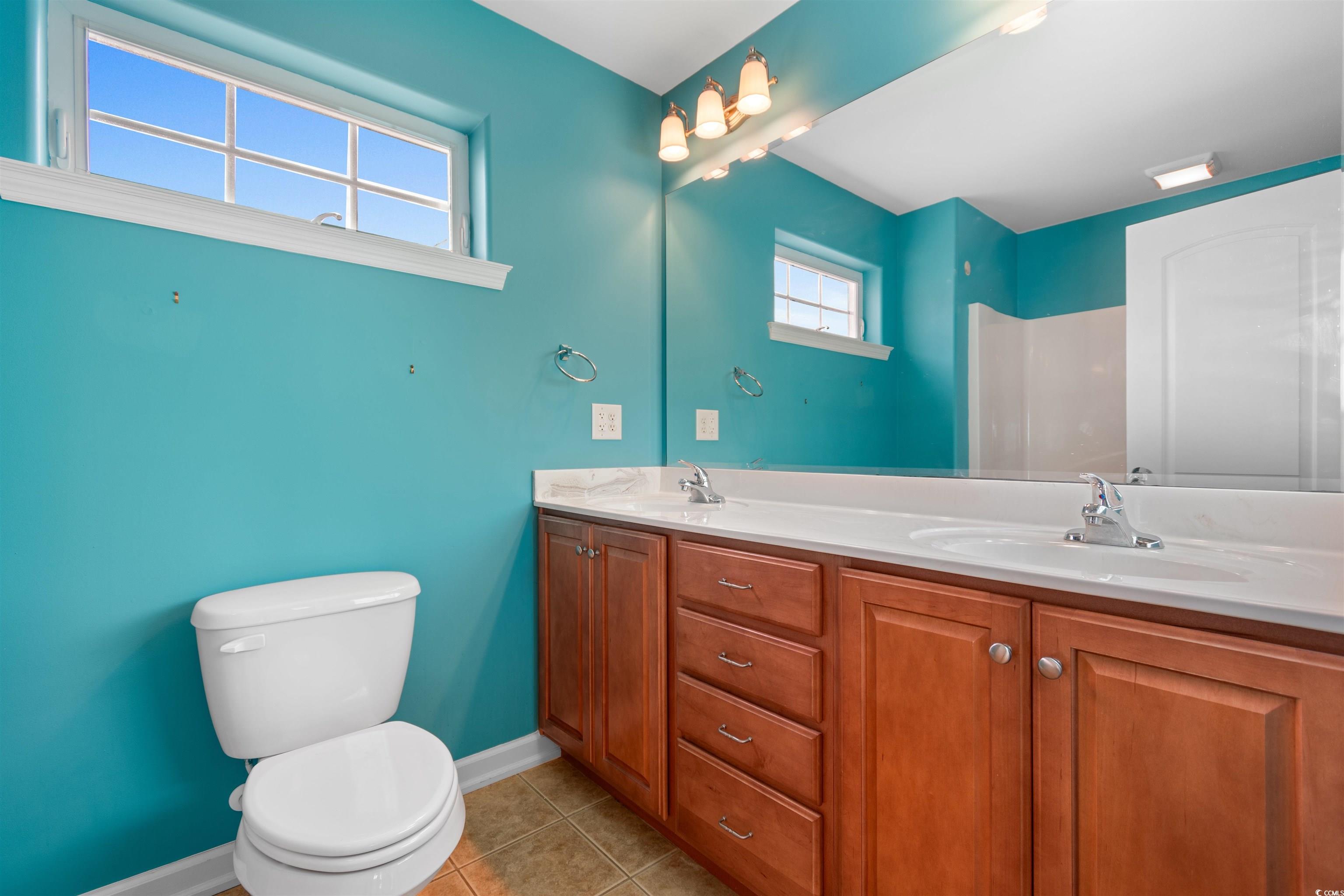 141 Terracina Circle Myrtle Beach, SC 29588 - Photo 17 of 40 Bathroom featuring tile patterned floors, vanity,