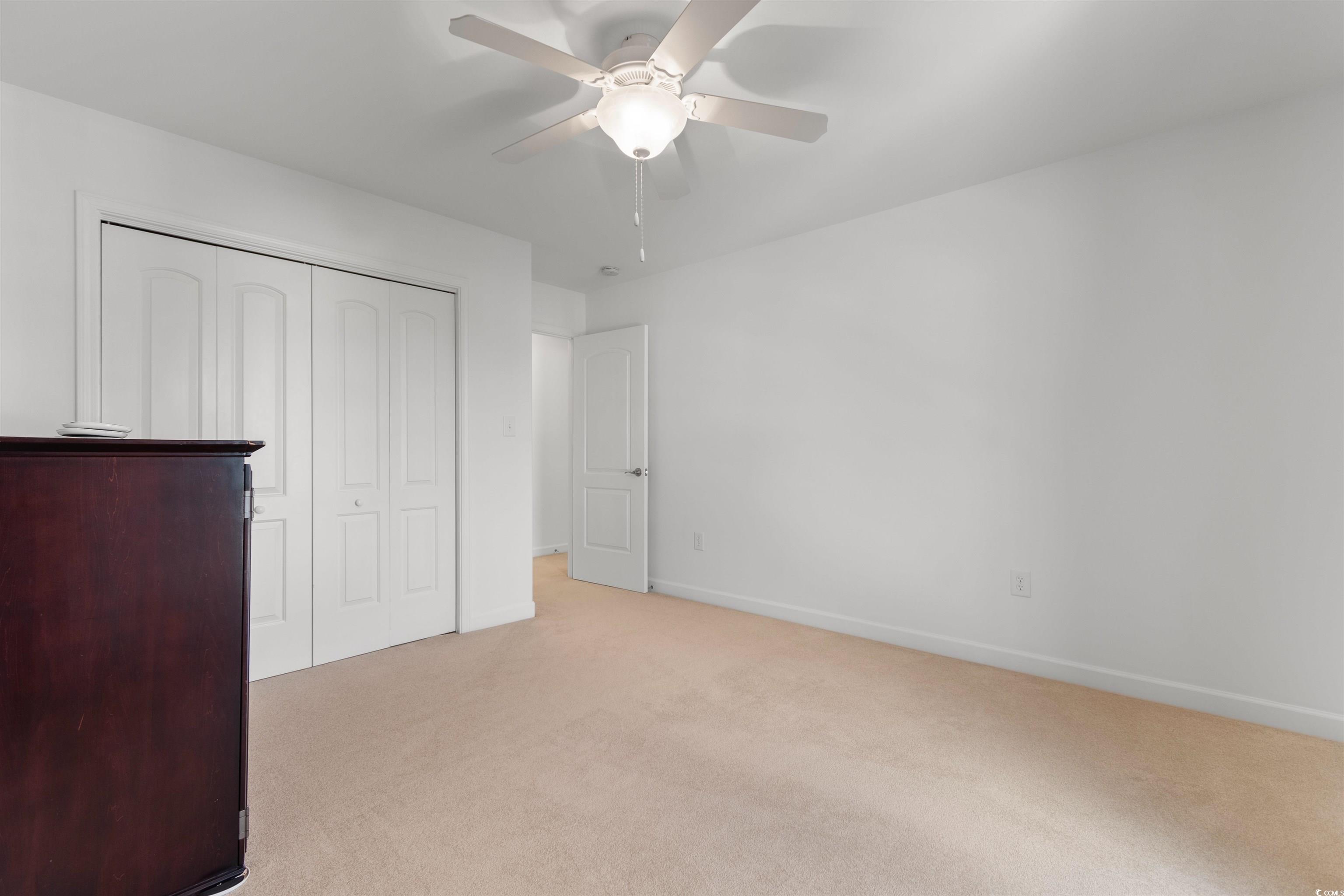 141 Terracina Circle Myrtle Beach, SC 29588 - Photo 20 of 40 Unfurnished bedroom featuring ceiling fan, light c