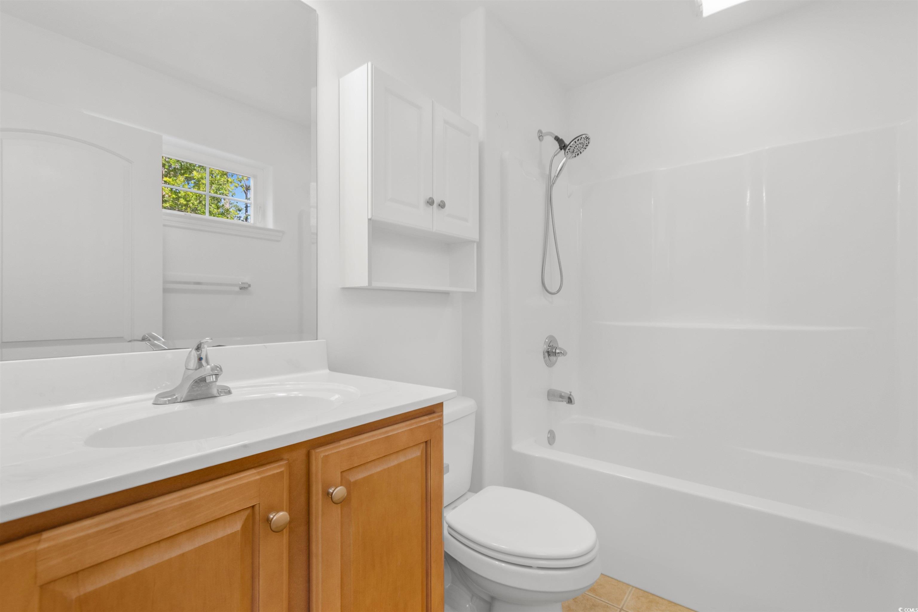 141 Terracina Circle Myrtle Beach, SC 29588 - Photo 21 of 40 Full bathroom with vanity, shower / bath combinati
