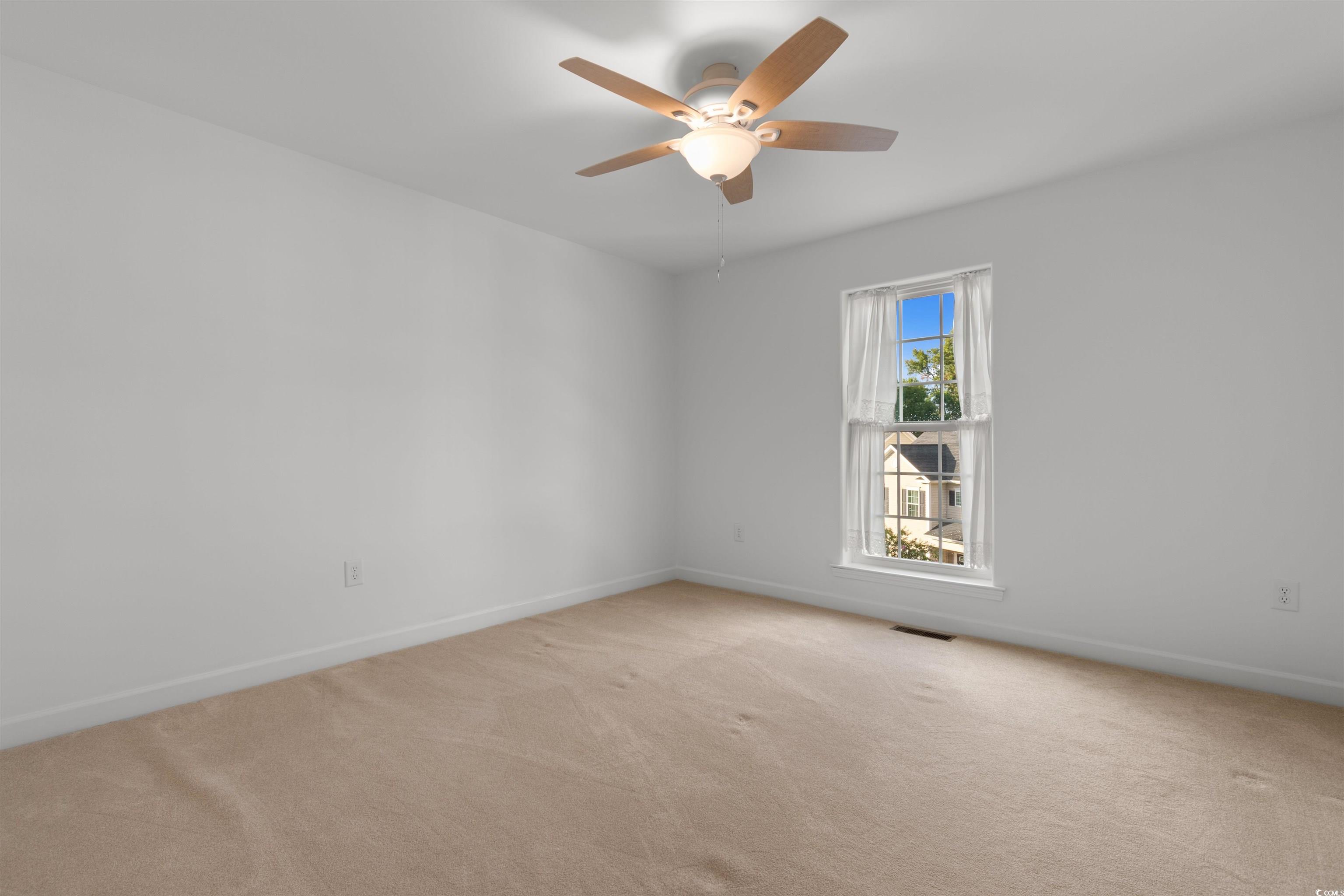 141 Terracina Circle Myrtle Beach, SC 29588 - Photo 23 of 40 Empty room featuring ceiling fan and light colored