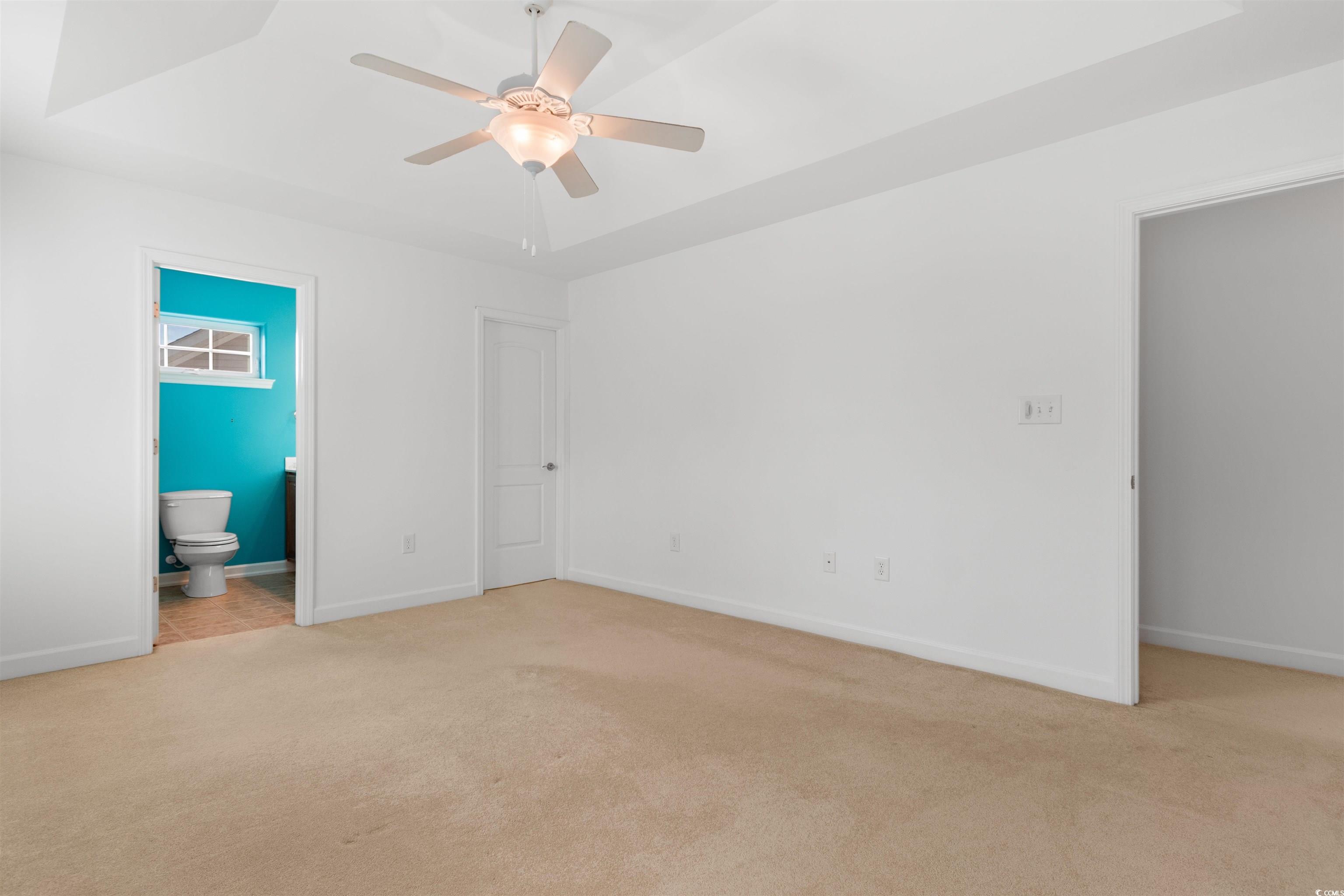 141 Terracina Circle Myrtle Beach, SC 29588 - Photo 25 of 40 Spare room with light carpet and ceiling fan