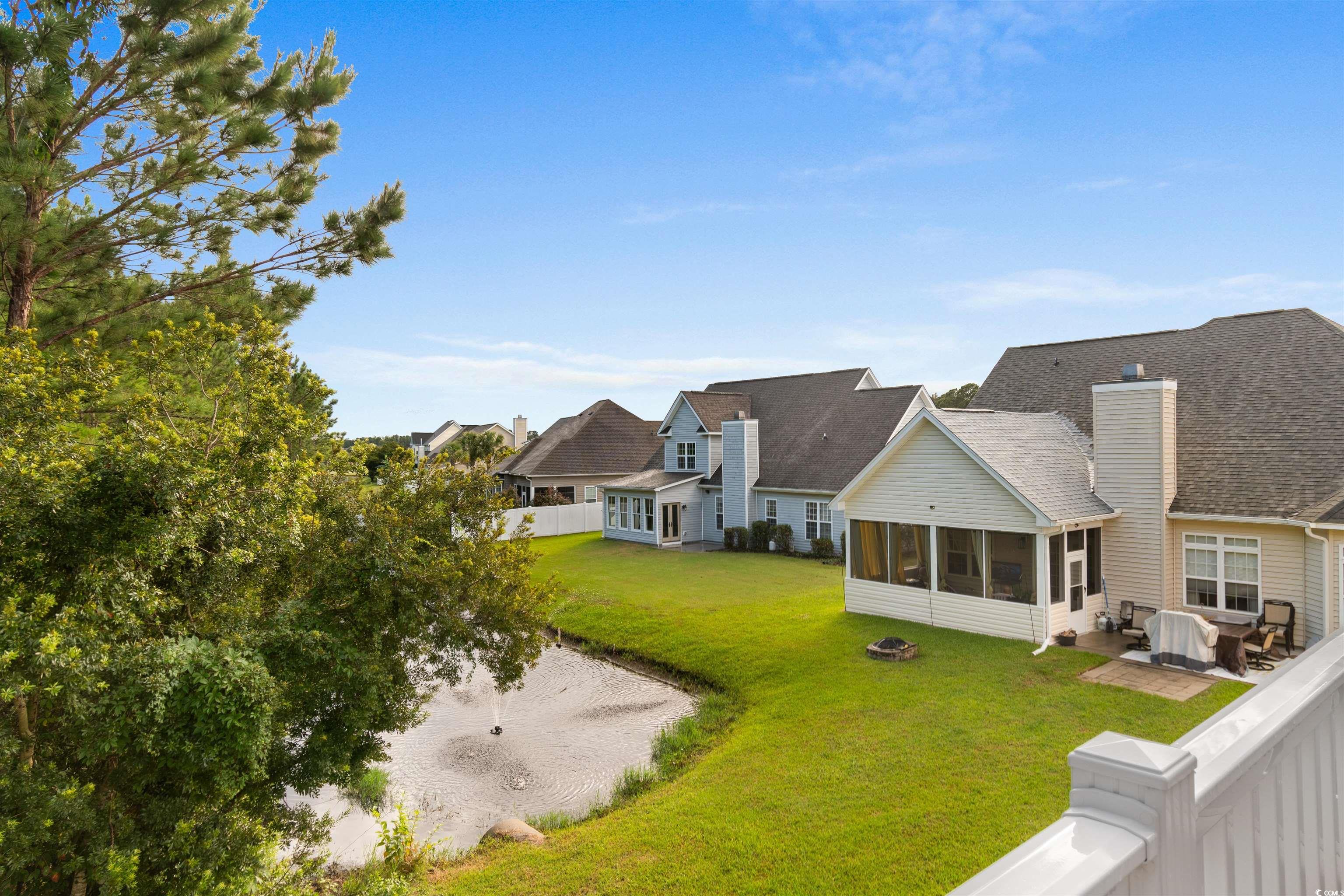 141 Terracina Circle Myrtle Beach, SC 29588 - Photo 29 of 40 View of yard with a sunroom