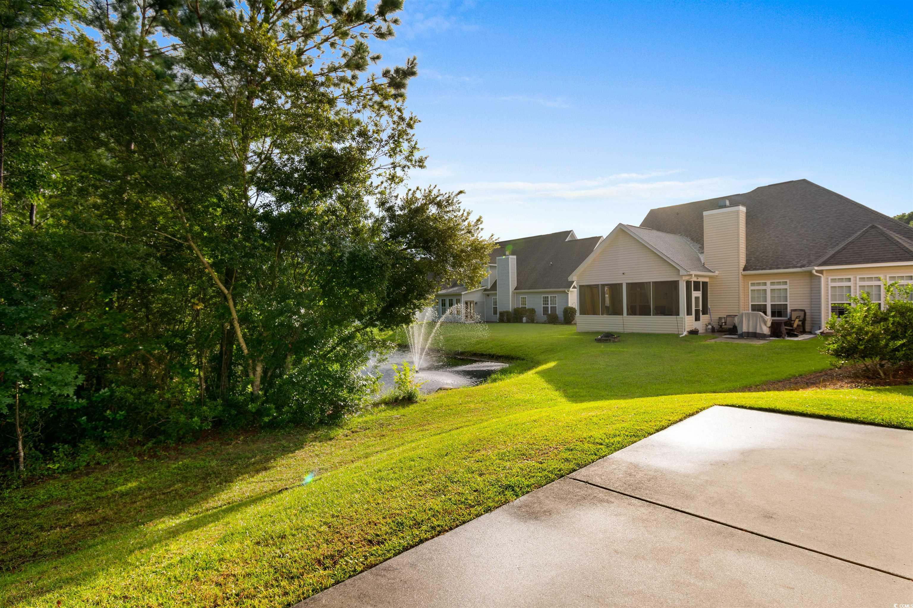 141 Terracina Circle Myrtle Beach, SC 29588 - Photo 30 of 40 View of yard featuring a sunroom