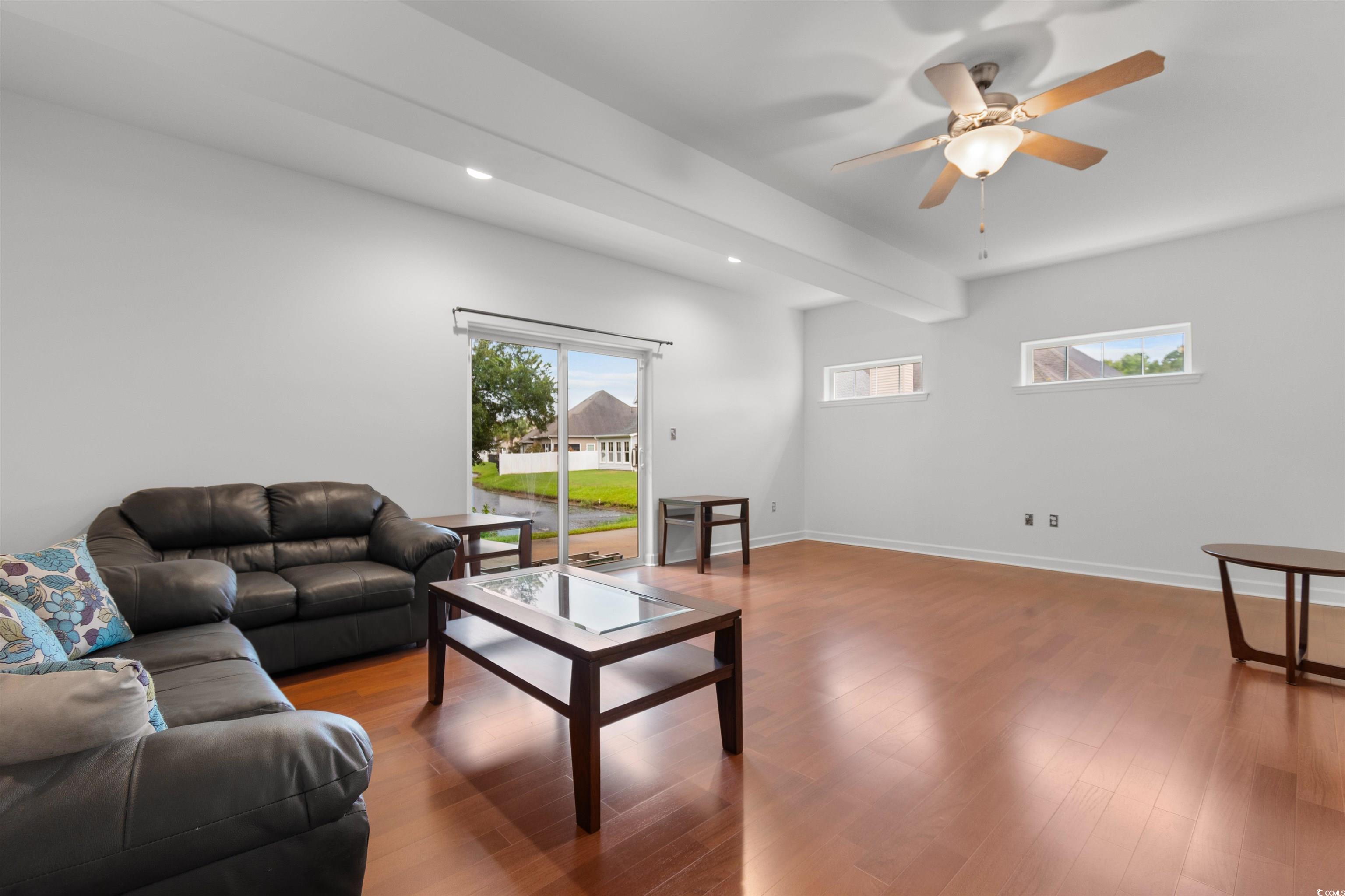 141 Terracina Circle Myrtle Beach, SC 29588 - Photo 3 of 40 Living room featuring hardwood / wood-style floors
