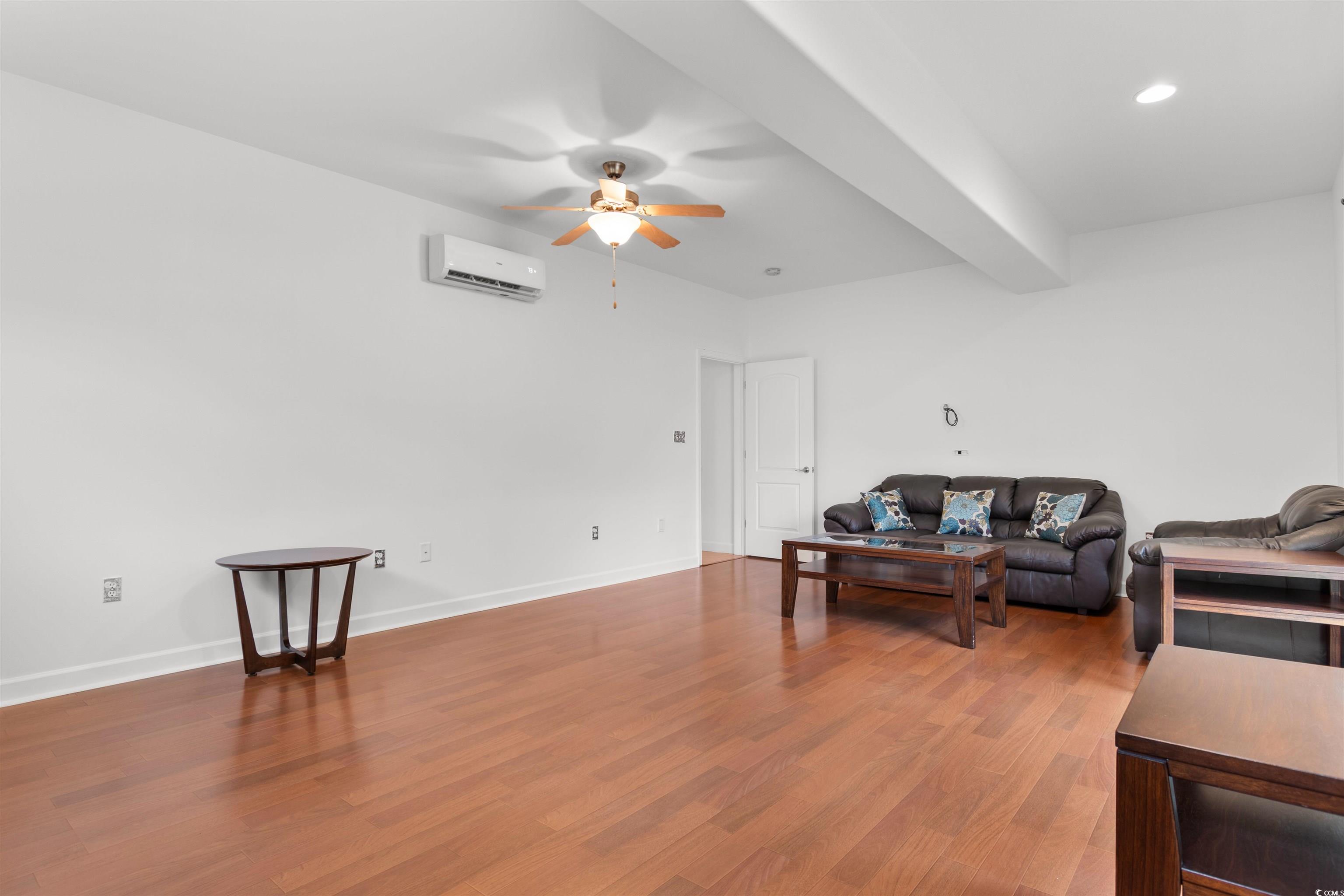 141 Terracina Circle Myrtle Beach, SC 29588 - Photo 4 of 40 Living room with wood-type flooring, ceiling fan,