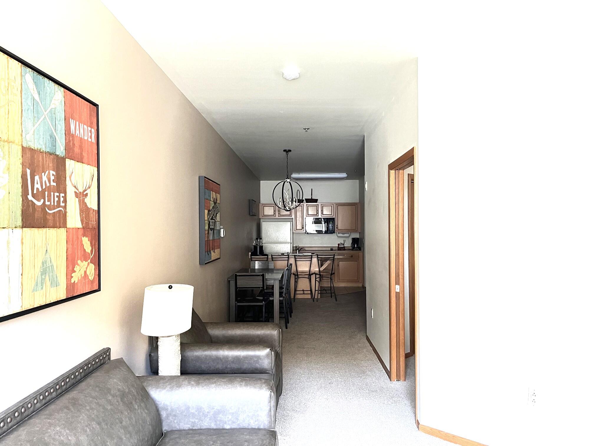 Undisclosed Address Lyons, WI 53147 - Photo 17 of 17 Living Room to Kitchen view
