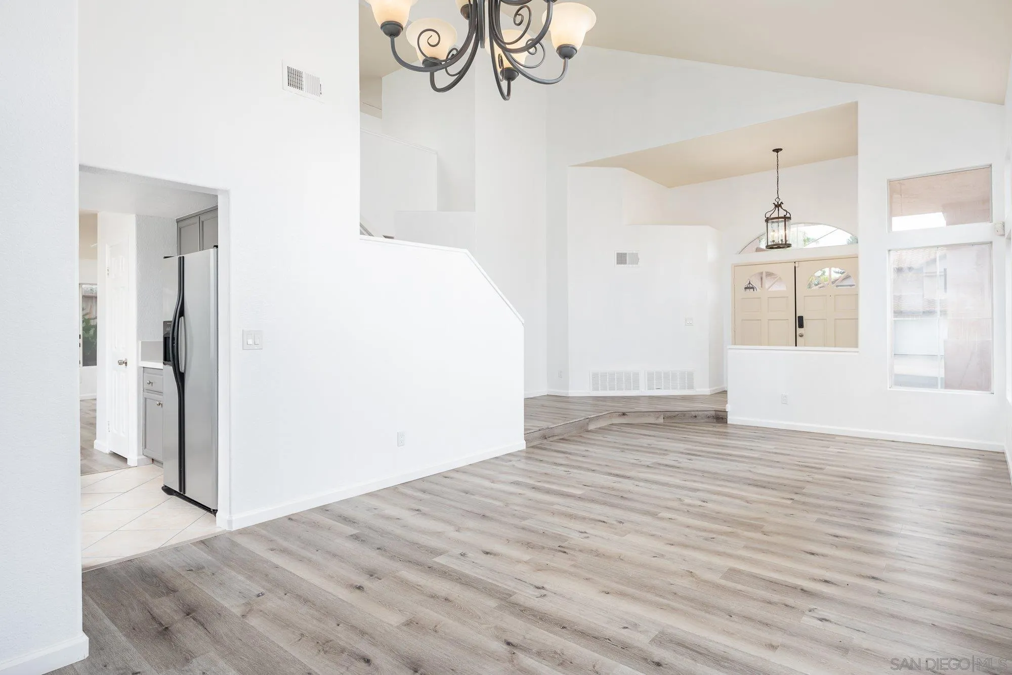 665 Montage Road Oceanside, CA 92057 - Photo 11 of 52 a view of empty room with wooden floor