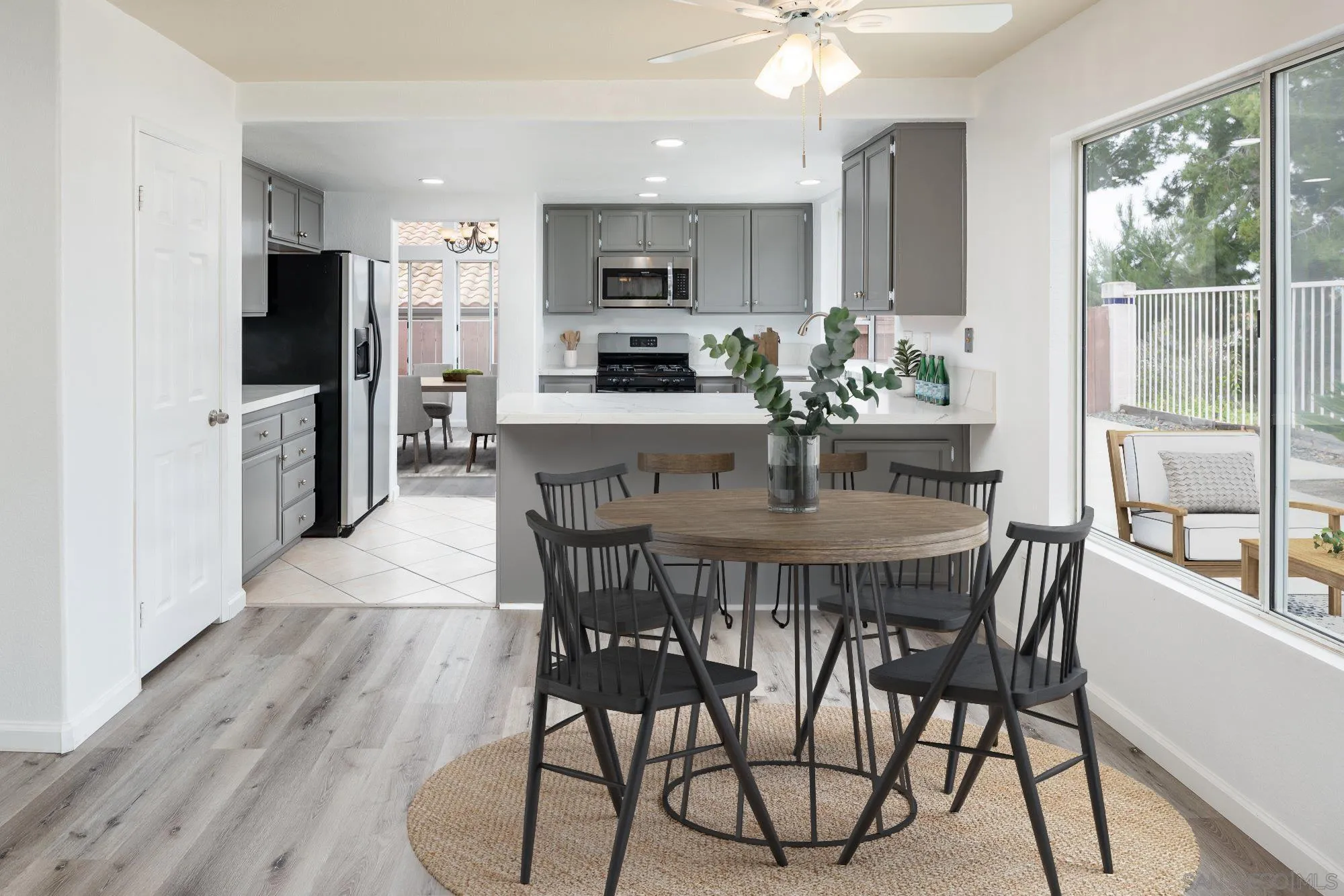 665 Montage Road Oceanside, CA 92057 - Photo 17 of 52 a view of a dining room with furniture window and outside view