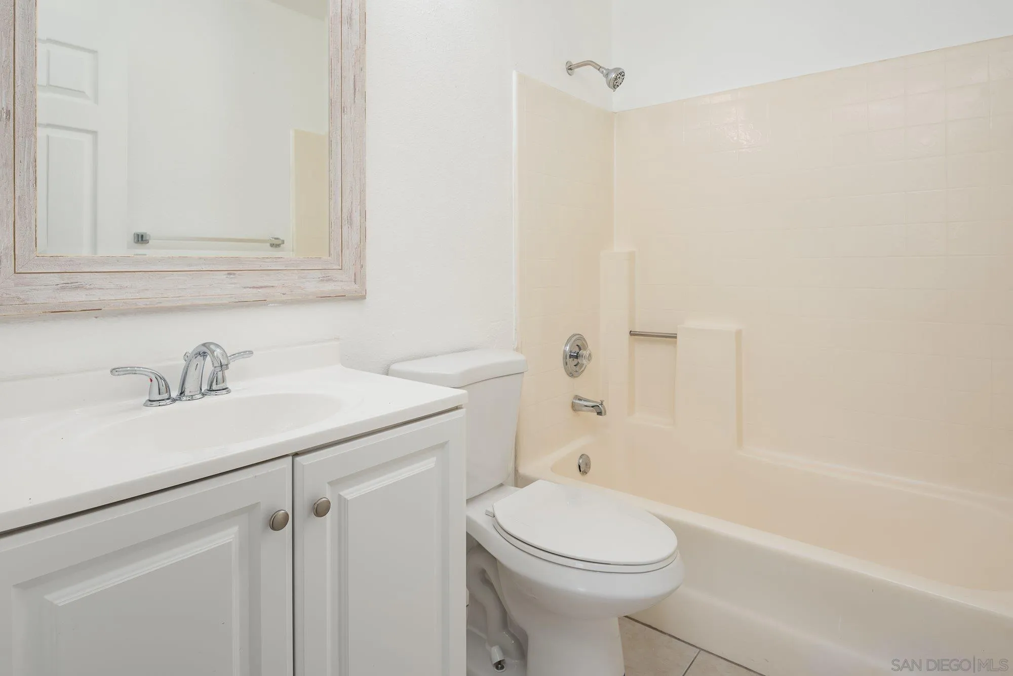 665 Montage Road Oceanside, CA 92057 - Photo 25 of 52 a bathroom with a sink a toilet and a bathtub