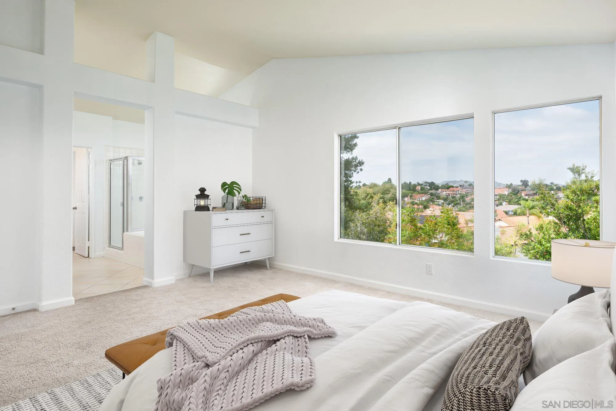 665 Montage Road Oceanside, CA 92057 - Photo 27 of 52 a bedroom with a bed and window