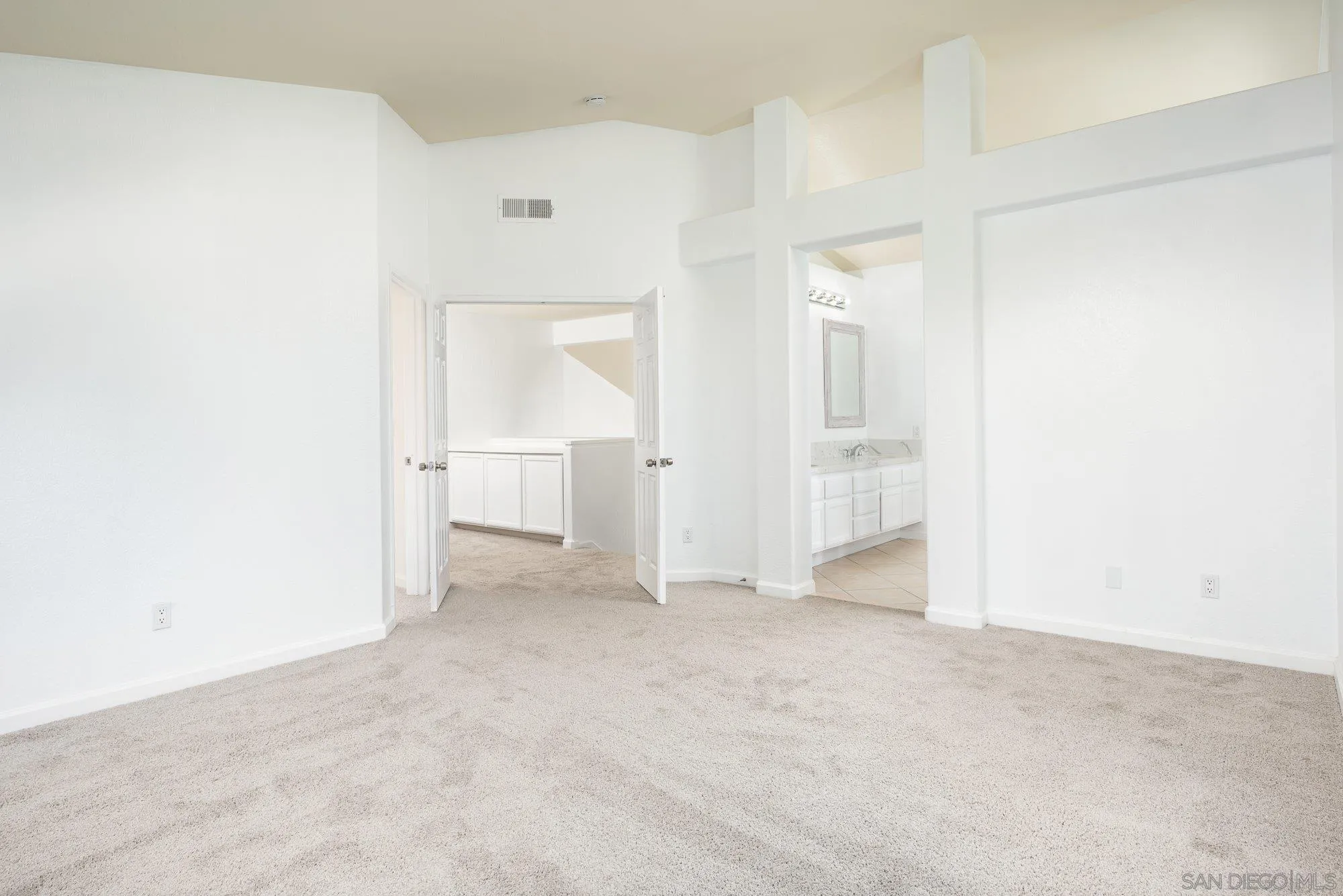 665 Montage Road Oceanside, CA 92057 - Photo 30 of 52 an empty room with an entryway and shower