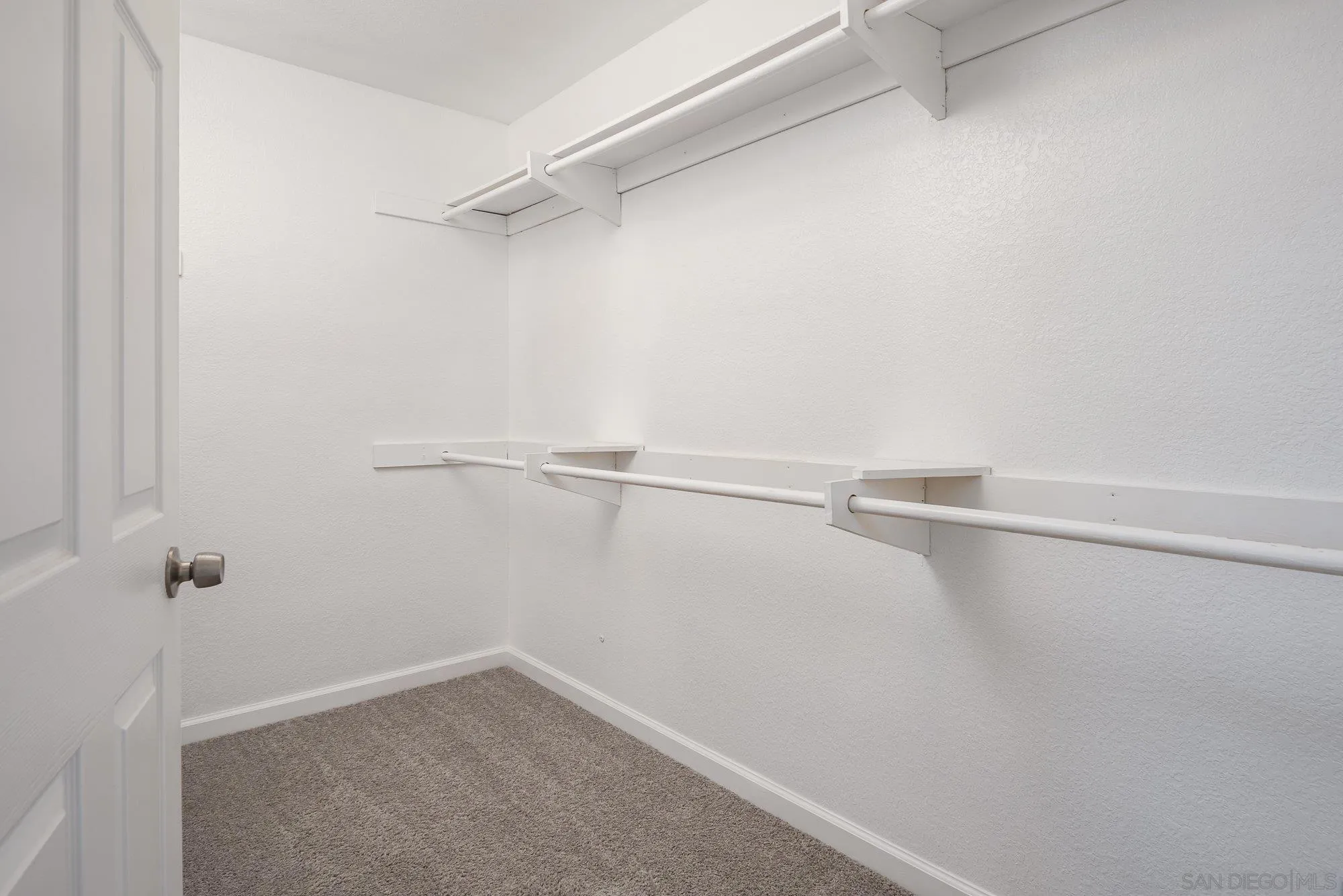 665 Montage Road Oceanside, CA 92057 - Photo 31 of 52 a view of a room with racks on the wall