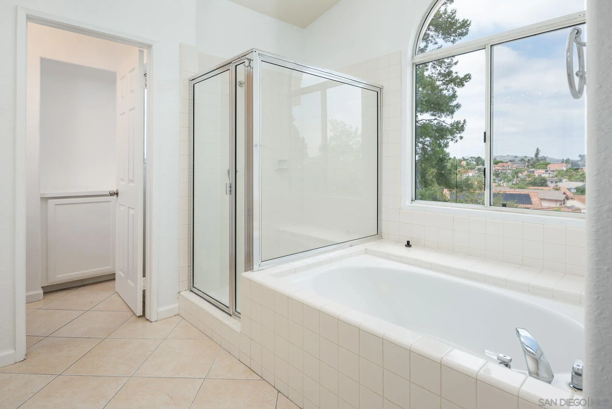 665 Montage Road Oceanside, CA 92057 - Photo 33 of 52 a bathroom with a bathtub and a shower