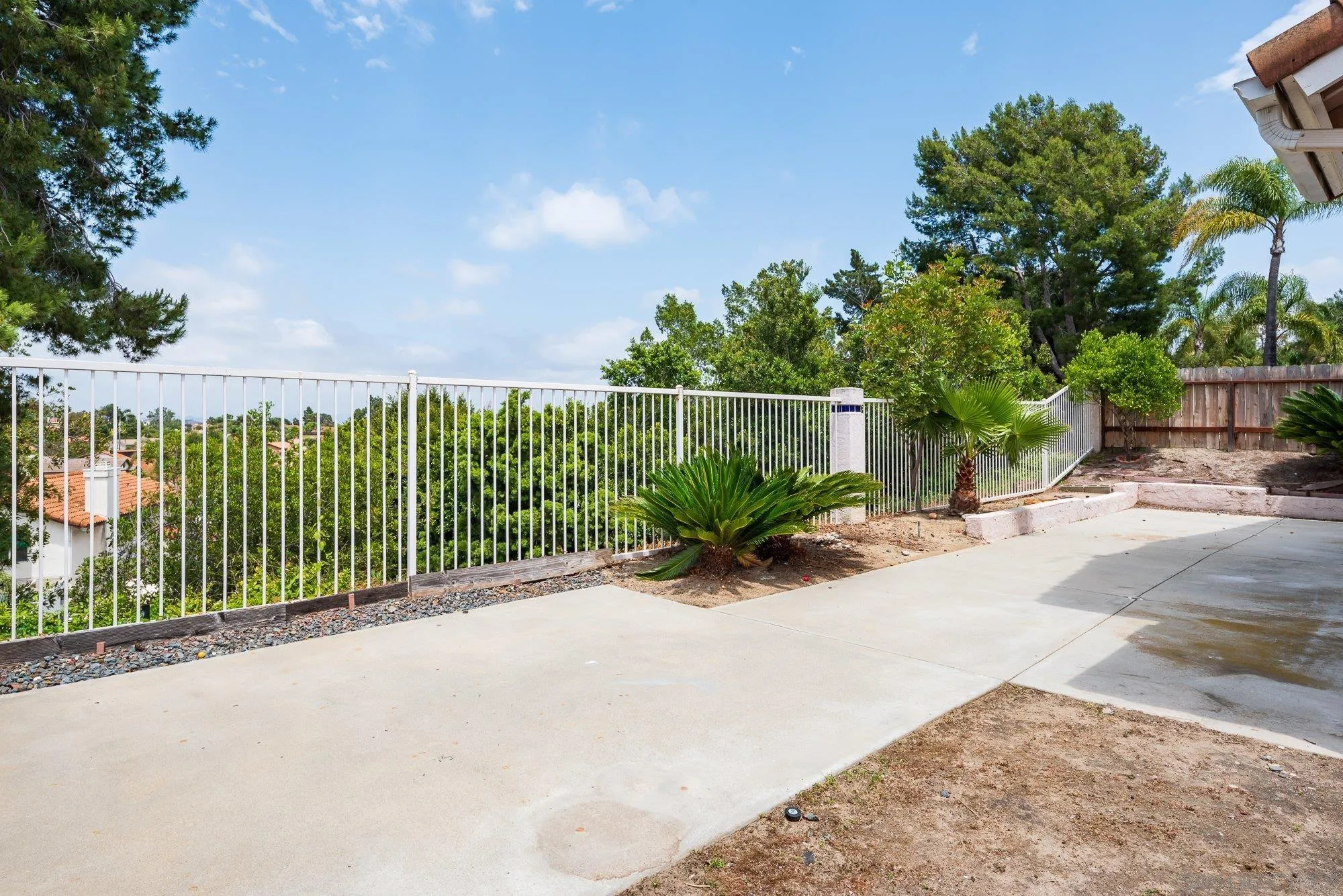 665 Montage Road Oceanside, CA 92057 - Photo 40 of 52 a view of a street from a bench
