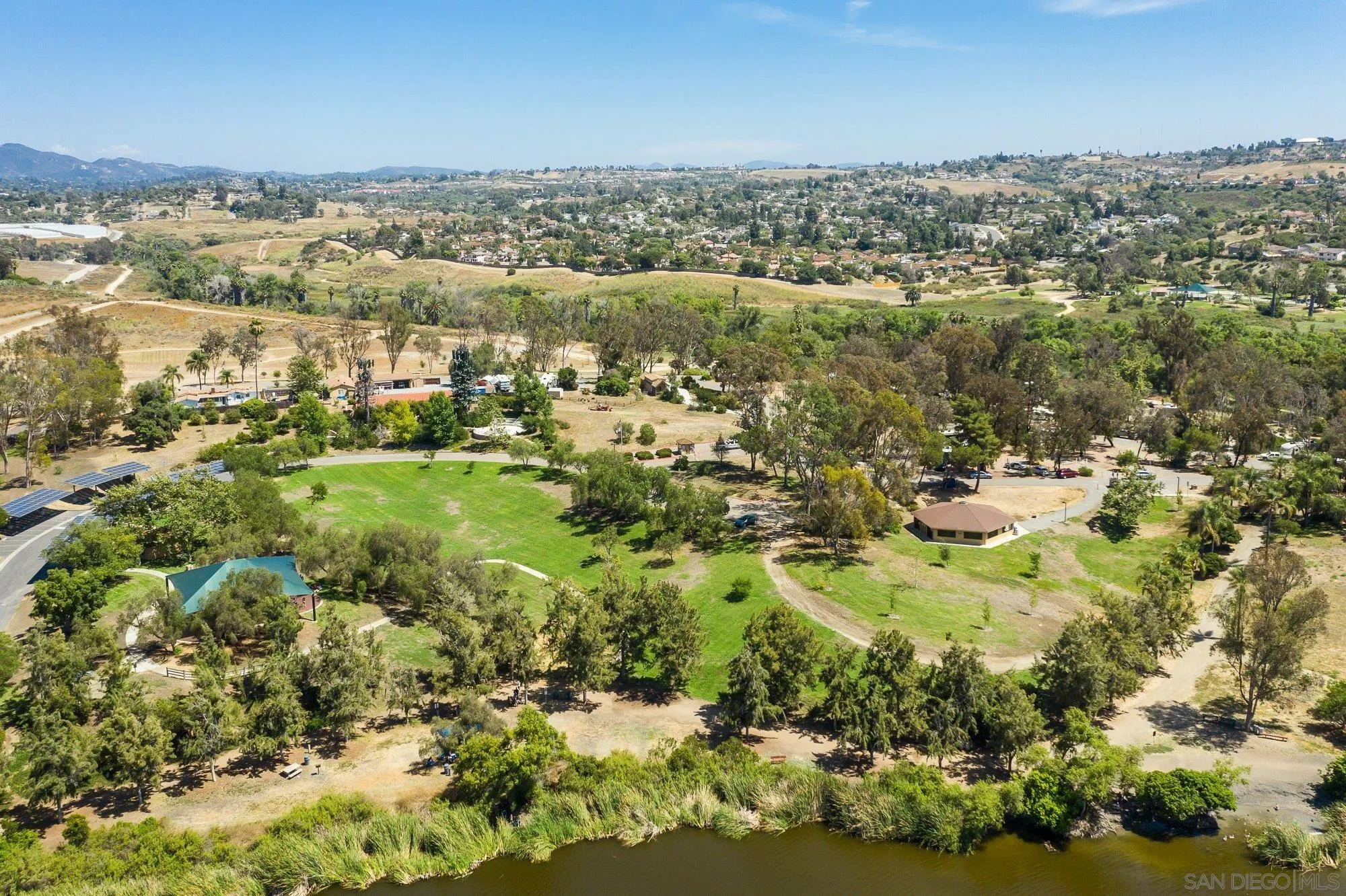 665 Montage Road Oceanside, CA 92057 - Photo 49 of 52 an aerial view of residential houses with outdoor space and trees