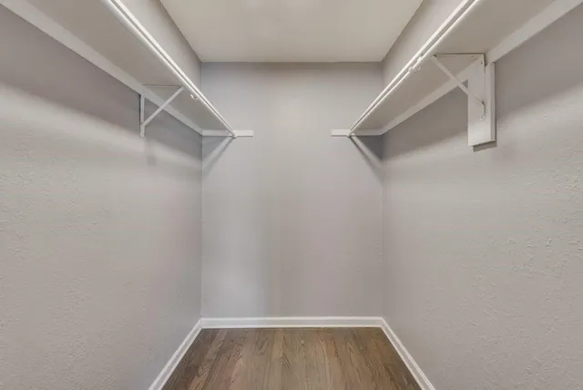 a view of an empty walk in closet