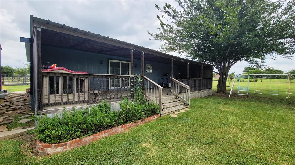 104 Mimosa Way Venus, TX 76084 - Photo 18 of 37 a view of a house with a yard