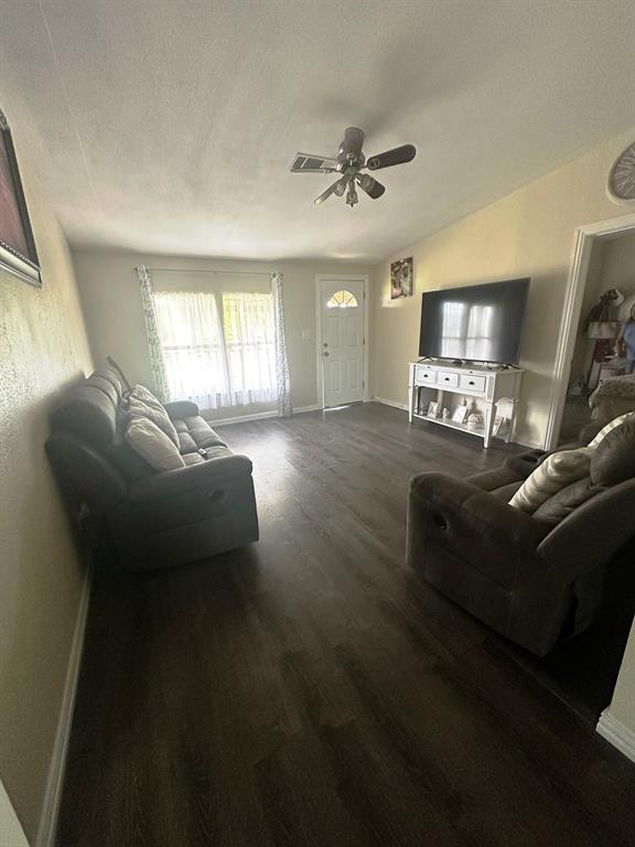 104 Mimosa Way Venus, TX 76084 - Photo 3 of 37 a living room with furniture and a hard wood floor