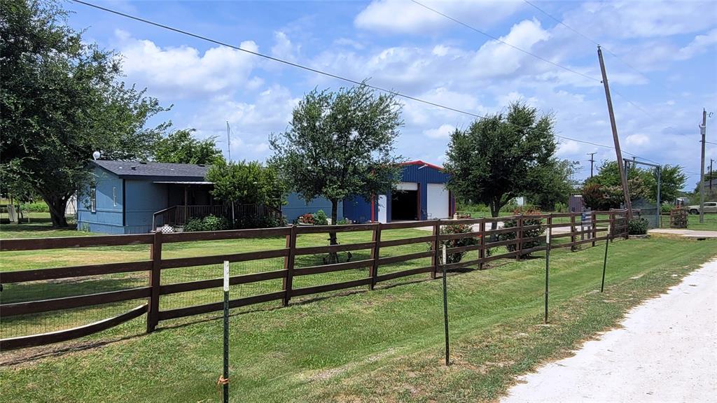 104 Mimosa Way Venus, TX 76084 - Photo 31 of 37 a view of a house with a yard