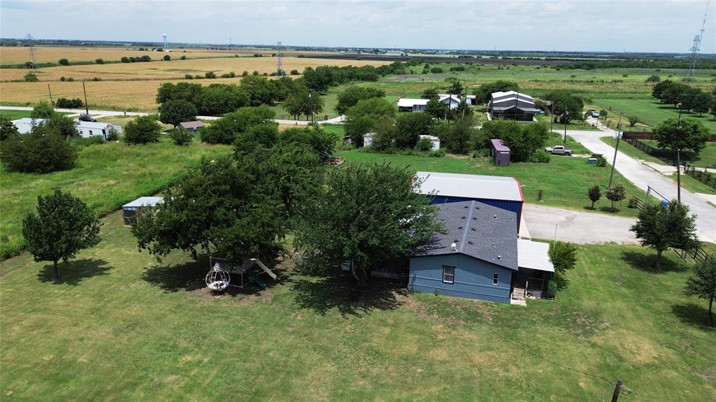 104 Mimosa Way Venus, TX 76084 - Photo 34 of 37 an aerial view of a house with a yard