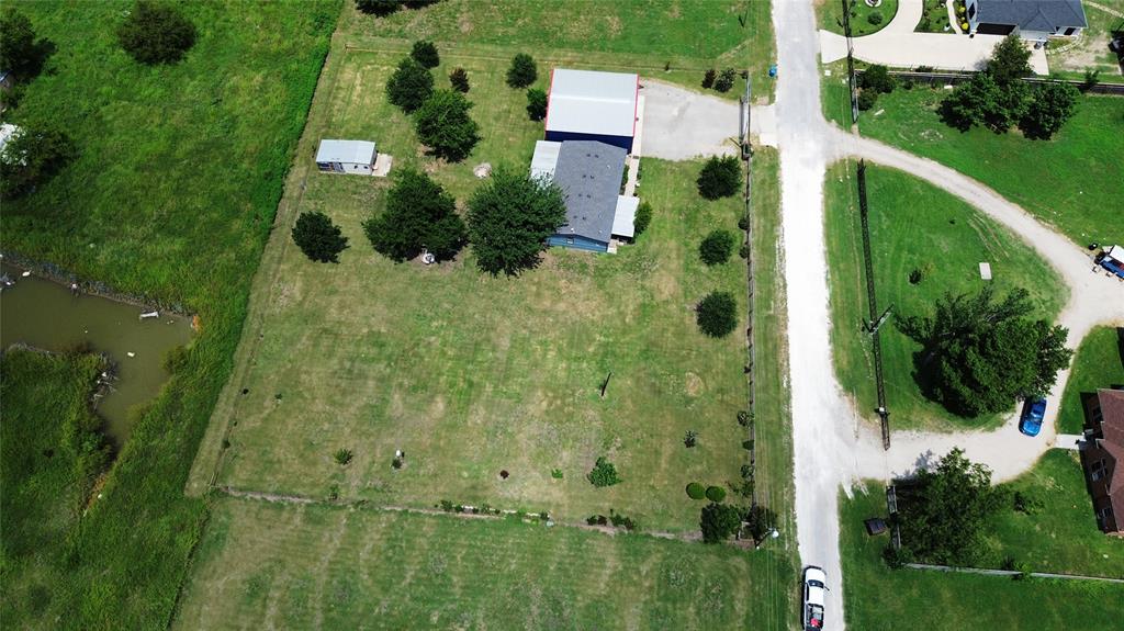 104 Mimosa Way Venus, TX 76084 - Photo 35 of 37 an aerial view of residential house with outdoor space