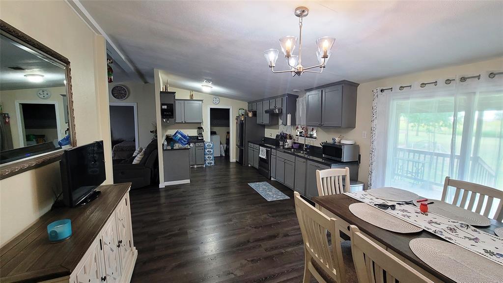 104 Mimosa Way Venus, TX 76084 - Photo 5 of 37 a kitchen with granite countertop lots of counter top space