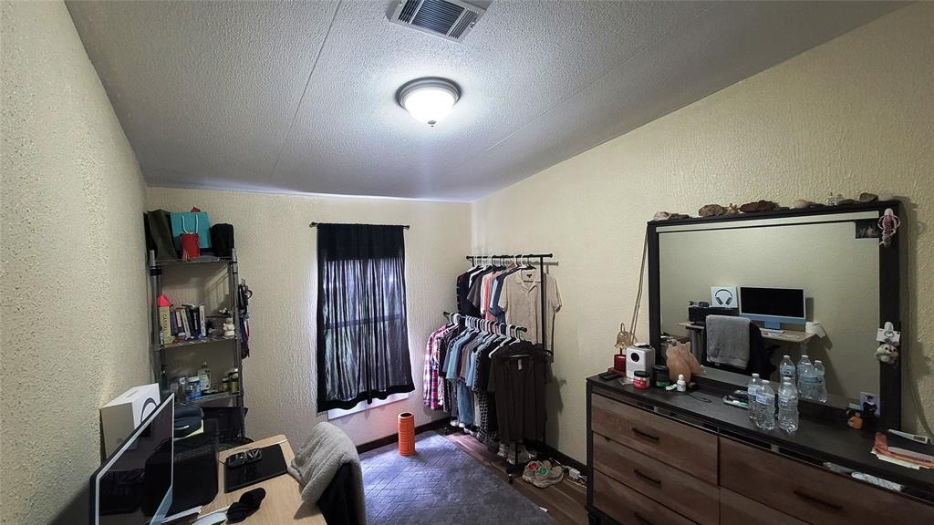 104 Mimosa Way Venus, TX 76084 - Photo 8 of 37 a view of a room with gym equipment