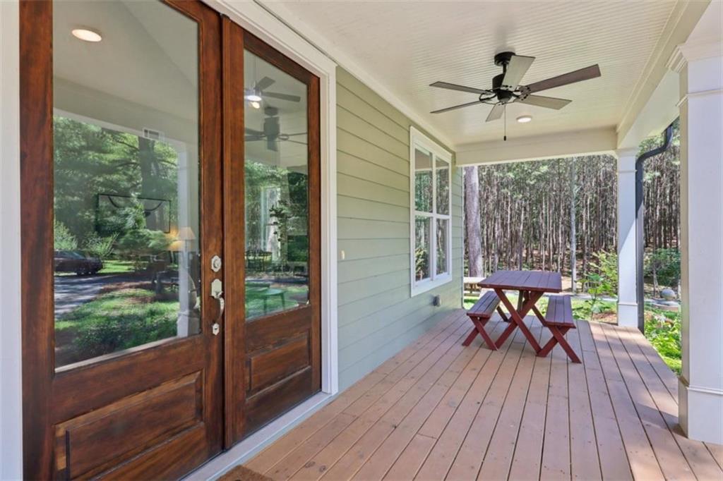 250 Stagecoach Road Oxford, GA 30054 - Photo 13 of 76 a view of a porch with furniture and a yard