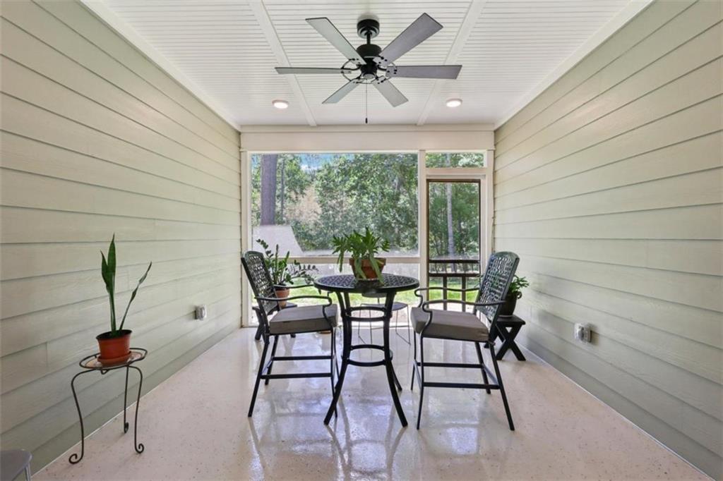 250 Stagecoach Road Oxford, GA 30054 - Photo 37 of 76 a view of a dining room with furniture and window