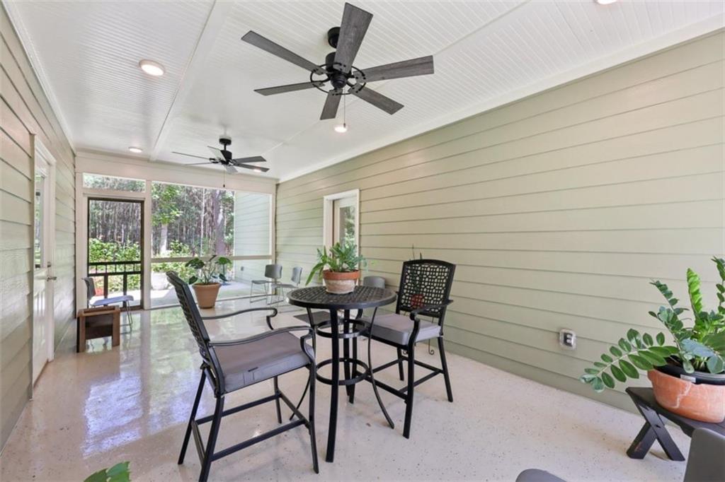 250 Stagecoach Road Oxford, GA 30054 - Photo 39 of 76 a dining room with furniture and window