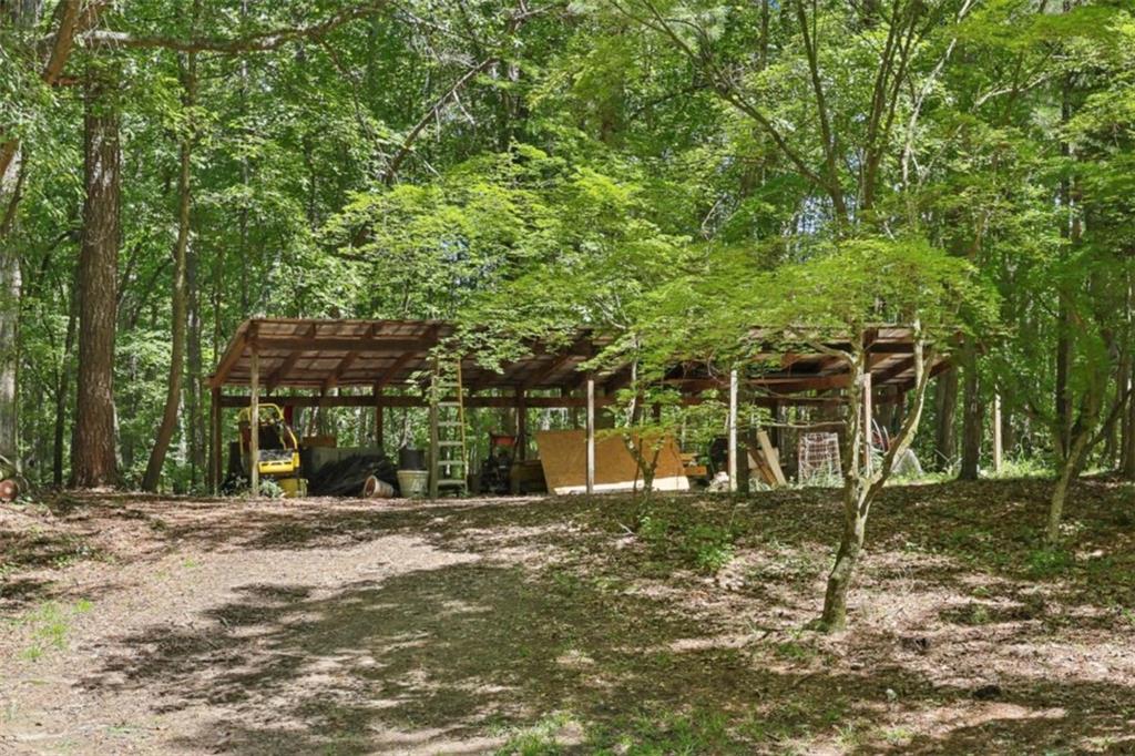 250 Stagecoach Road Oxford, GA 30054 - Photo 56 of 76 a front view of a house with a yard