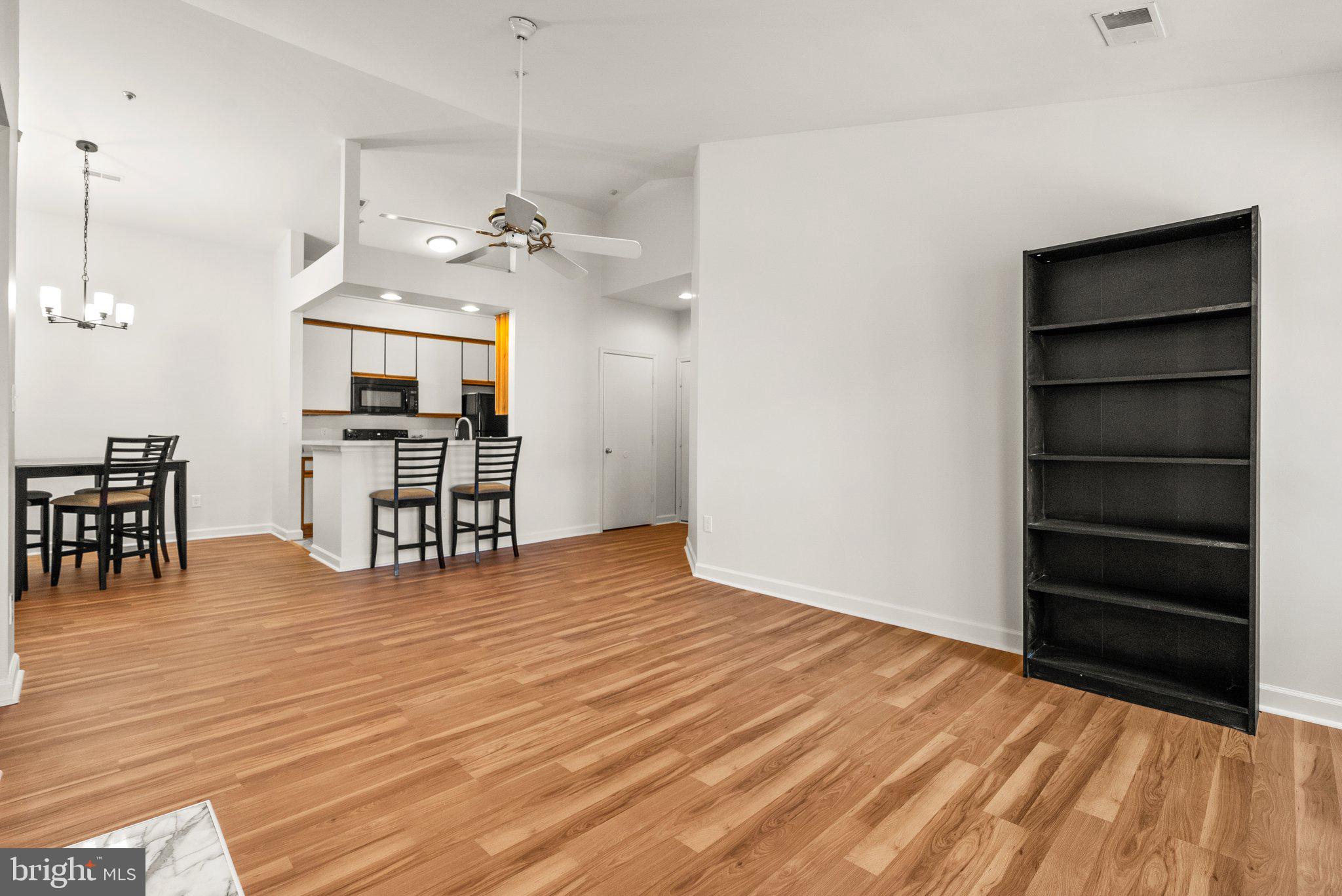 3301 Sir Thomas Drive, Unit 6B41 Silver Spring, MD 20904 - Photo 12 of 27 a view of workspace with furniture and wooden floor