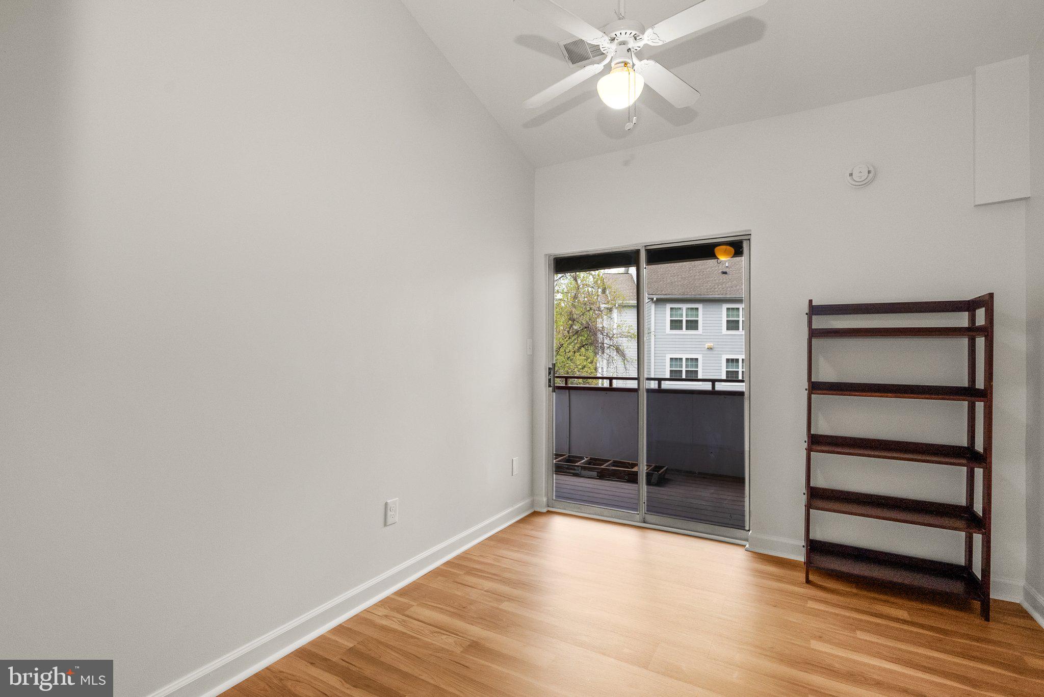 3301 Sir Thomas Drive, Unit 6B41 Silver Spring, MD 20904 - Photo 21 of 27 wooden floor in an empty room