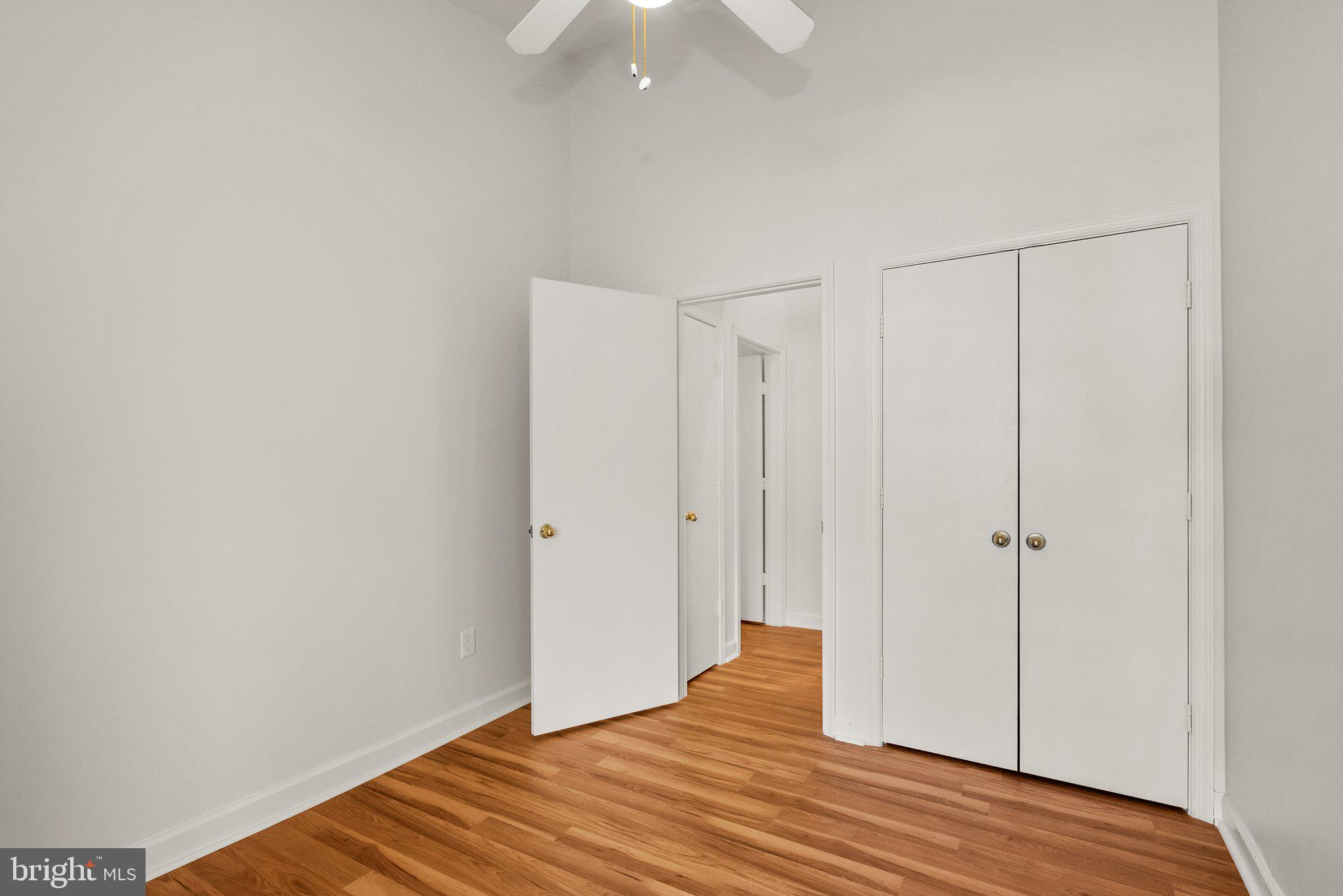 3301 Sir Thomas Drive, Unit 6B41 Silver Spring, MD 20904 - Photo 22 of 27 a view of a room with wooden floor