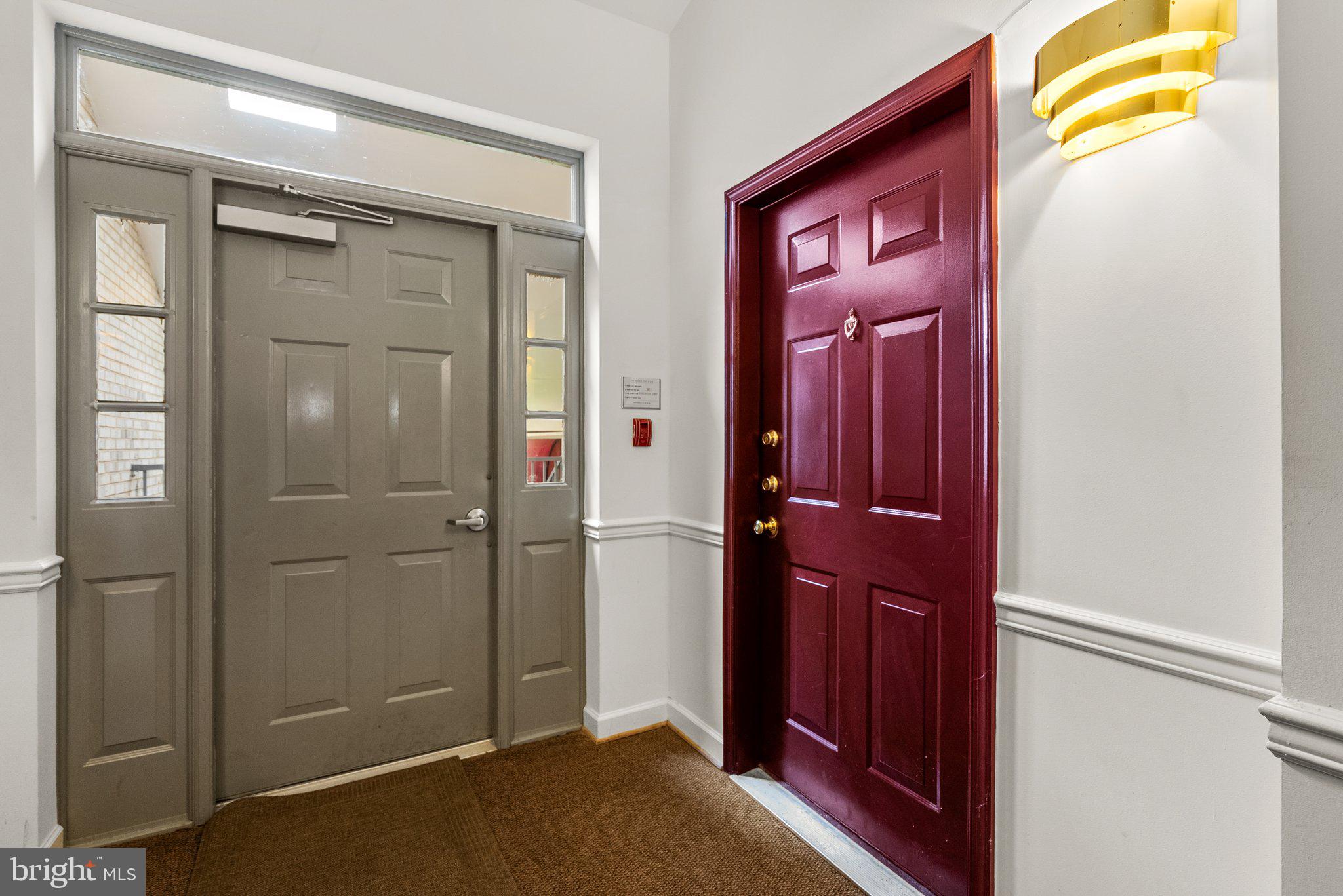3301 Sir Thomas Drive, Unit 6B41 Silver Spring, MD 20904 - Photo 4 of 27 a view of a hallway