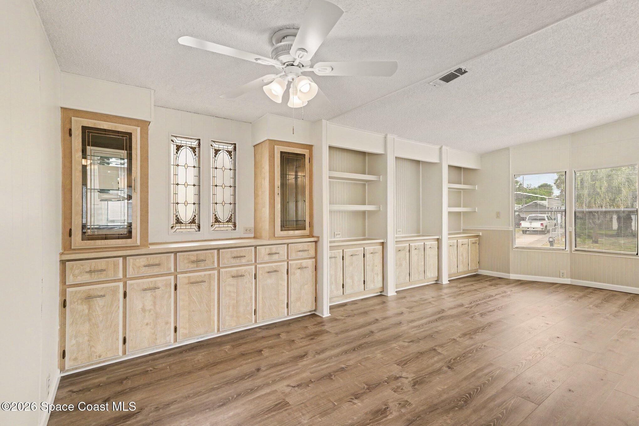 604 Breezeway Drive Cocoa, FL 32926 - Photo 13 of 26 Dining area with built in cabinetry
