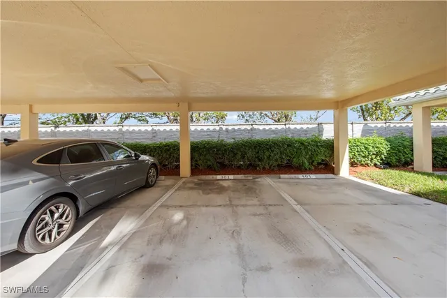 a view of a car parked in front of a building