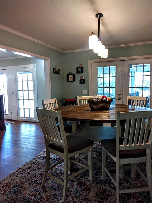 13 Gracie Road DeBary, FL 32713 - Photo 17 of 53 a view of a dining room with furniture window and wooden floor