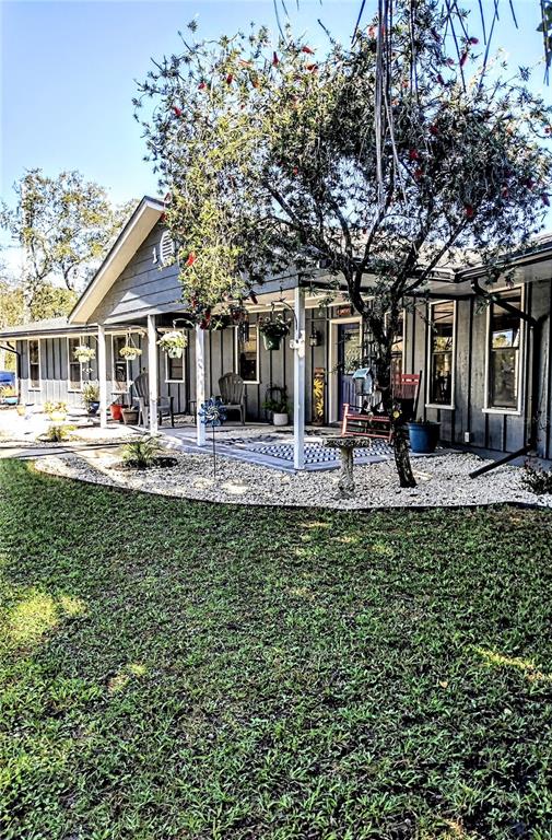 13 Gracie Road DeBary, FL 32713 - Photo 2 of 53 a front view of a house with a yard