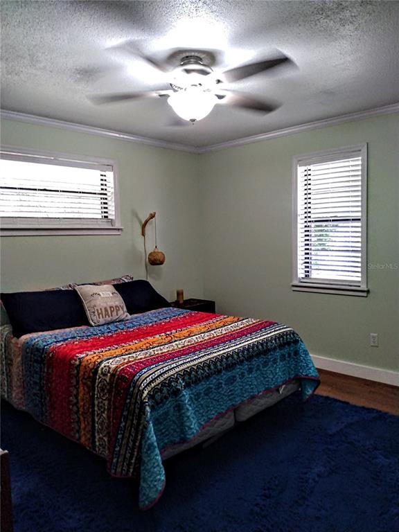 13 Gracie Road DeBary, FL 32713 - Photo 29 of 53 a bedroom with a bed and a window
