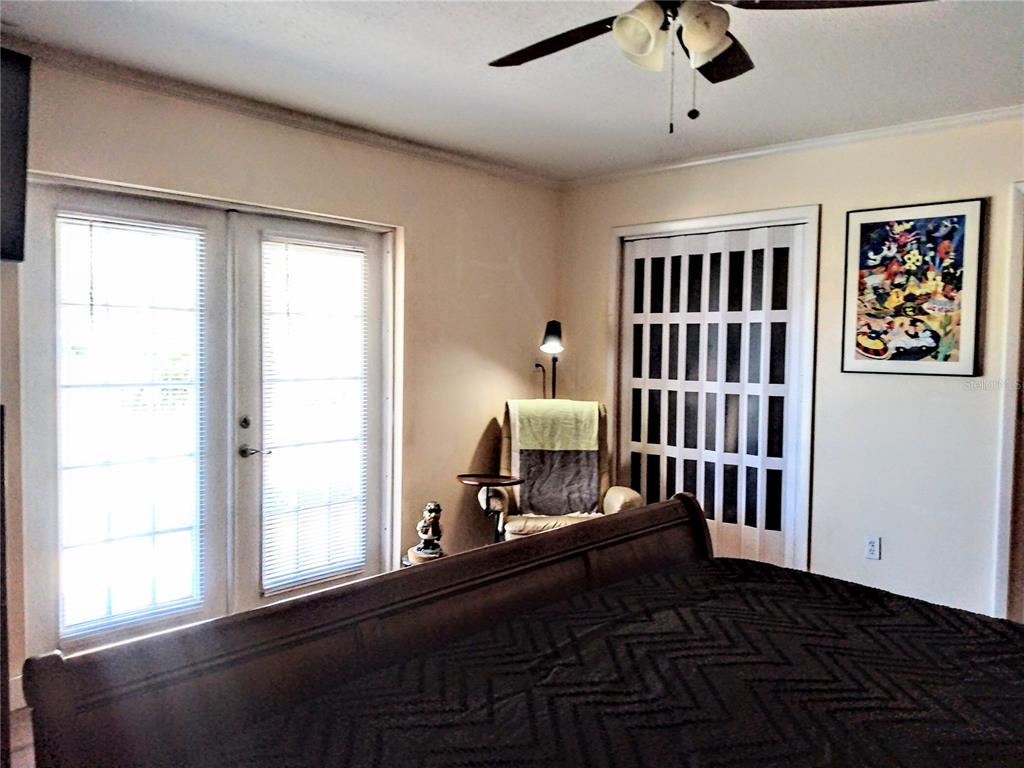 13 Gracie Road DeBary, FL 32713 - Photo 34 of 53 a bedroom with furniture and window