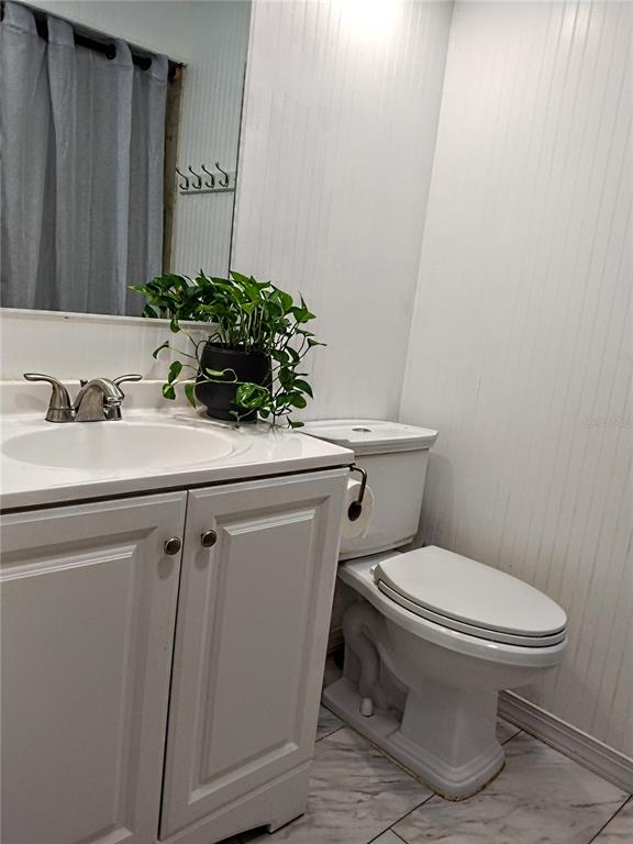 13 Gracie Road DeBary, FL 32713 - Photo 38 of 53 a bathroom with a sink toilet and mirror