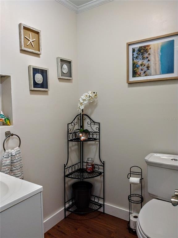 13 Gracie Road DeBary, FL 32713 - Photo 41 of 53 a bathroom with a toilet a sink and mirror