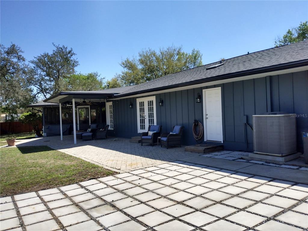 13 Gracie Road DeBary, FL 32713 - Photo 46 of 53 a front view of house with yard outdoor seating and barbeque oven