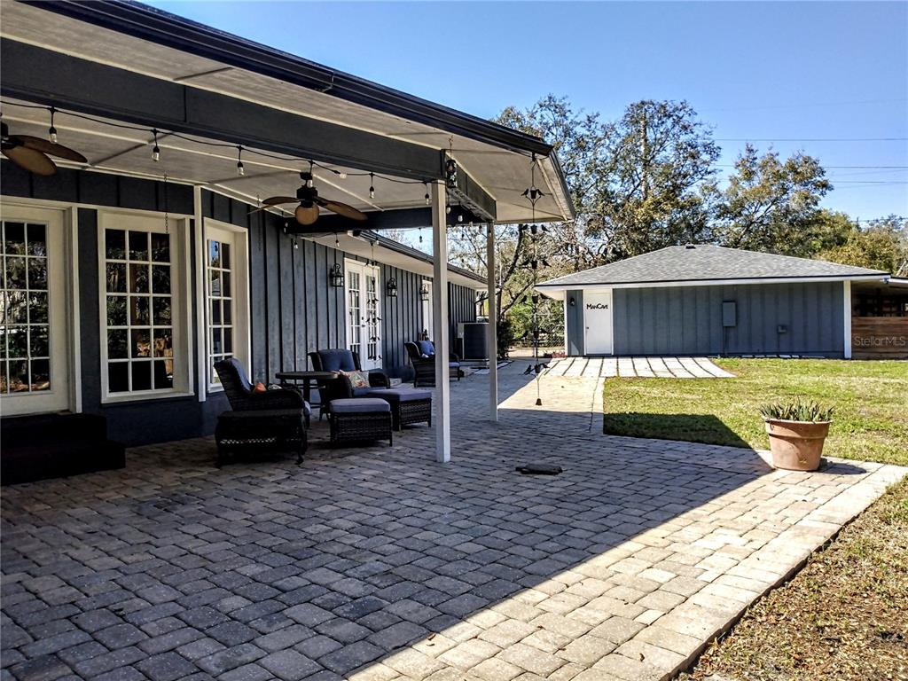 13 Gracie Road DeBary, FL 32713 - Photo 47 of 53 a view of a house with backyard and sitting area